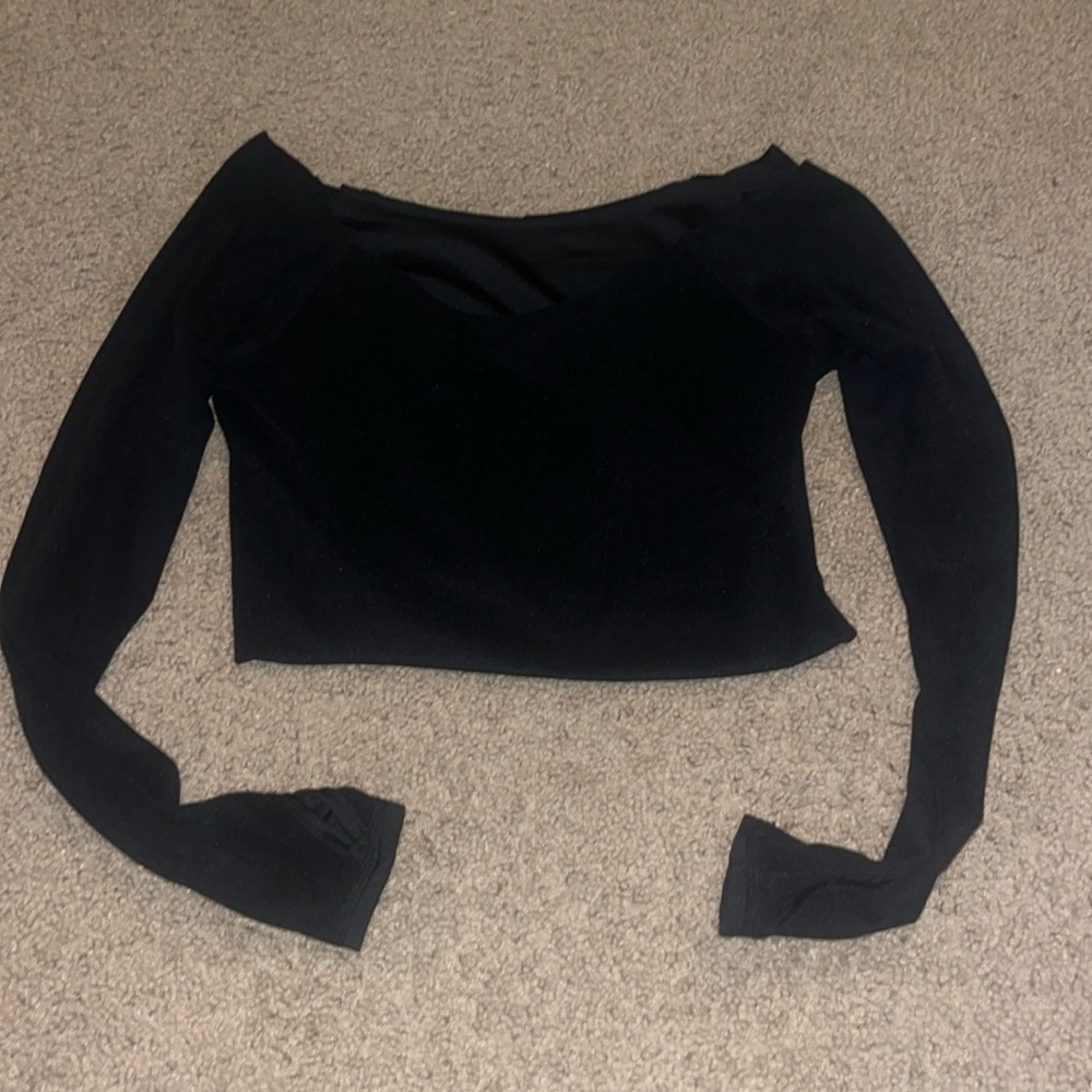 small long sleeved basic black shirt. v neck